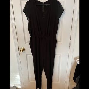 Black sheer top jumpsuit, cinched waist with pockets